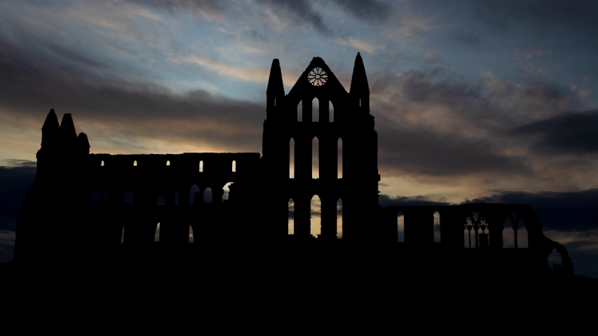 Whitby Abbey: Time Lapse at Sunrise, Ruined Gothic Church which Inspired the Novel Dracula, Yorkshire, England, UK Royalty-Free Stock Footage #1039225691