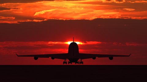 Large passenger airplane taking off and flying towards scenic orange sunset. Suitable as an iillustration for tourism, holidays, vacation, success, business and transportation concept video