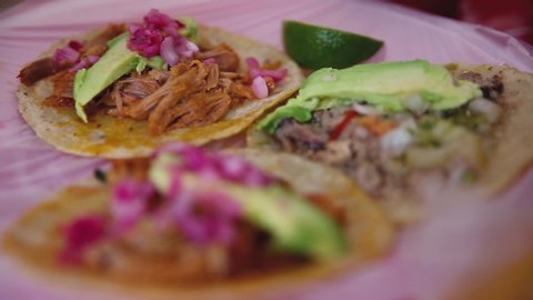 Traditional Mexican tacos are filled with sauce