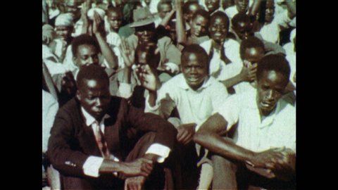 1960s: AFRICA: people in crowd clap. Nigeria wins freedom from colonialism. Free nations in Africa.