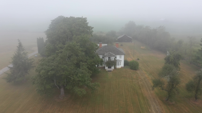 Slow aerial orbit to the right of Pearl S. Buck birthplace museum in Hillsboro, West Virginia.