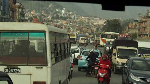 Kathmandu / Nepal - 06 30 2019: Chaotic Street Traffic on Budy Day, Authentic Scenery