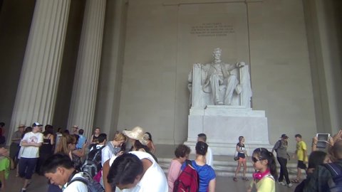 Washington DC / United States - 09 26 2019: Crowds surround the statue of Abraham Lincoln at the Lincoln Memorial in Washington DC