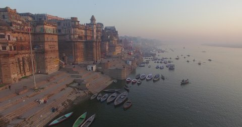 Drone Shot of the beautiful, crowded coastline on the river in the city of Varanasi, India.