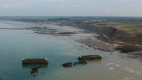 WWII - ruins of the Mulberry harbour at Gold Beach, Normandy, France, Aerial view 