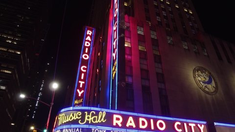 New York , New York / United States - 06 11 2019: The Radio City Music Hall in Manhattan, New York at night.