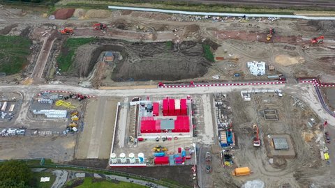 Aerial footage of a housing development site in the town of Crossgates in Leeds West Yorkshire UK, showing new housing being built on the house development construction site