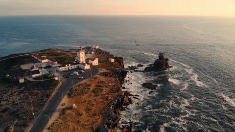 Aerial View of Lighthouse in Peniche, Portugal, and Cabo Carvoeiro at Sunset