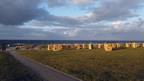 Probstei Schleswig Holstein hooded beach chairs and Baltic Sea, 4k video footage