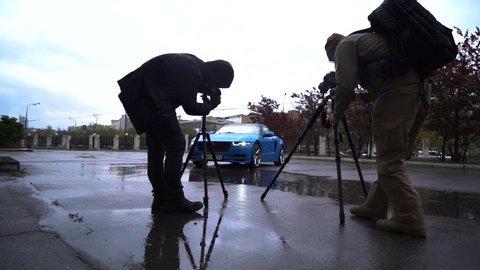 Moscow, Russia - 10 12 2019: New russian model car roadster crimea blue color on the street. Roadster Krim footage on the road. Photographer doing shots of new sport russian car on the street.