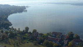 Aerial view of the coast at lake constance pan to the right along the coast. Close to oberhuldingen.