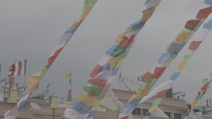 Boudhanath, Kathmandu - Boudhanath Square, Pilgrims and prayers around the temple - Prayer flags