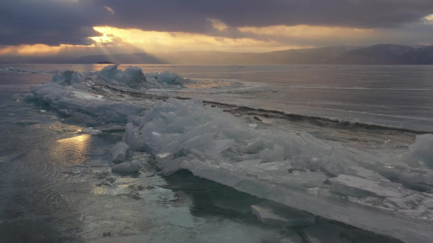 Sunset on the frozen lake Baikal in Siberia.