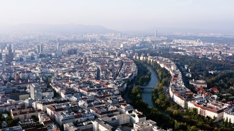 Vienna aerial view in Austria is one of the most famous capital cities of Europe. Flying by above Danube River, the historic city centre feat. old buildings around the downtown in HD and 4K