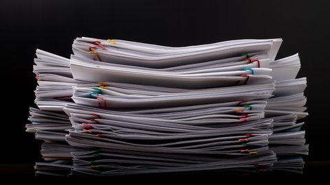 Stack overload document report paper with colorful paperclip place and copy space, business concept footage paperless used – 4K Stop motion.