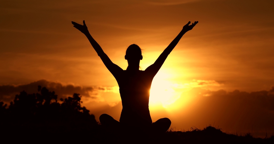 Young woman relaxing in summer sunset lifting her arms up to the sky. People freedom, feeling, positive lifestyle. Royalty-Free Stock Footage #1039414145