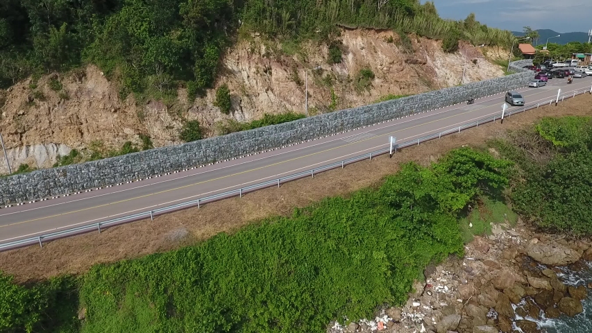 Aerial view of cars driving along on Chalerm Burapa Chollathi Road in Chantaburi,Thailand
