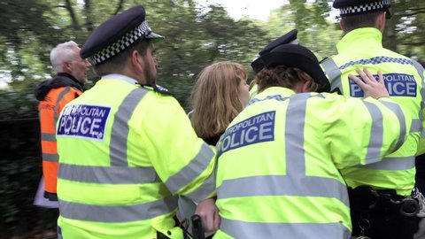 London / United Kingdom (UK) - 10 08 2019: Police carry off arrested women protestors
