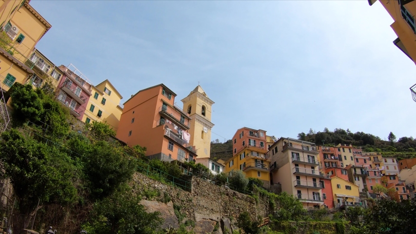 Walking through and looking up the hill in Manarola, Cinque Terre, Italy