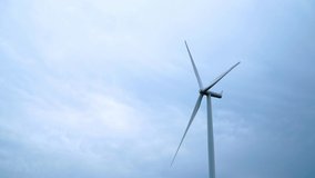 Modern Wind Turbines with digitally generated holographic display tech data visualization.Wind Turbines with clean energy counter layout for sustainable development in a green ecologic way - Powered by Shutterstock - Get 15% off with code: PIKWIZARD15