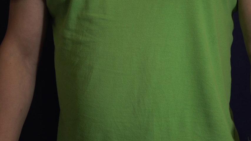 A man with an arm in a cast keeps money from the cost and expense of emergency medical care in a hospital . Paid medicine..Man