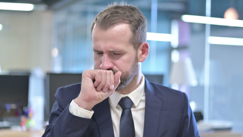 Portrait of Sick Businessman having Coughing in Office | Shutterstock HD Video #1039463372