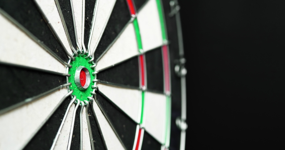 4K - Dart hits the bullseye. Side view Royalty-Free Stock Footage #1039470269