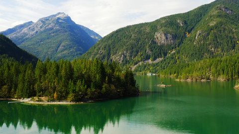 Aerial view of Diablo Lake, North Cascade mountains of Washington state, Northeast of USA, deep emerald lake, American hills mountains and lakes