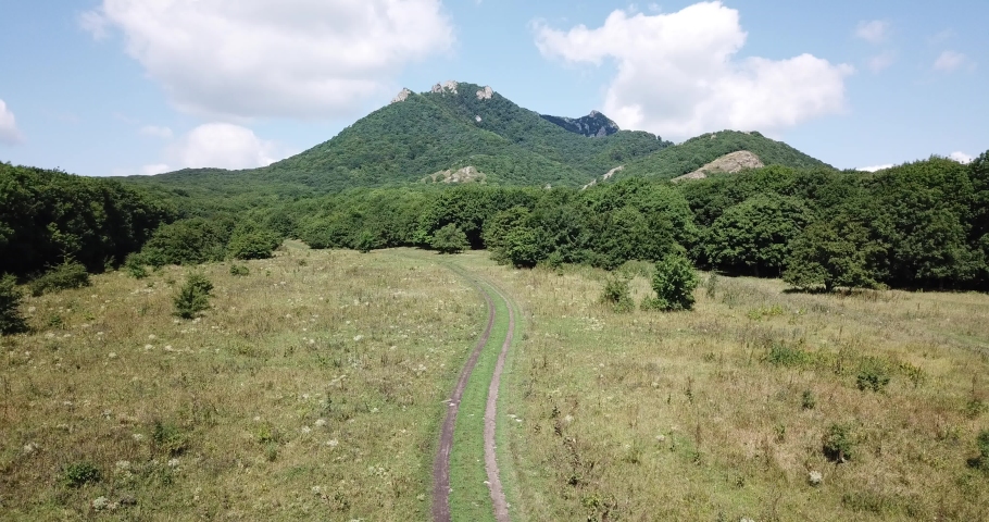 Tourists are walking in Caucasian mountains. Caucasus. Russia
