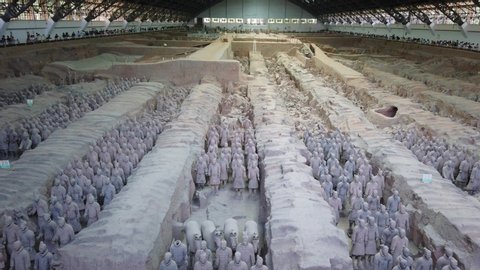 Xian / China - 07 23 2019: Xian, China - July 2019 : An army of terracota clay soldiers, created during the reign of first chinese emperor Qin Shi Huang Di, Xian, Shaanxi Province