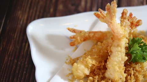 Japanese food: Tempura prawn served with soy sauce and Japanese cooked rice on table. Clean food concept. 