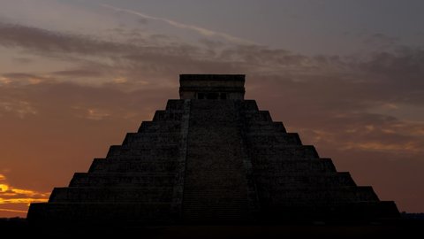Maya Pyramid: Time Lapse at Sunrise with Mayan Kukulcan Temple and Colorful Clouds, Chichen Itza, Yucatan, Mexico
