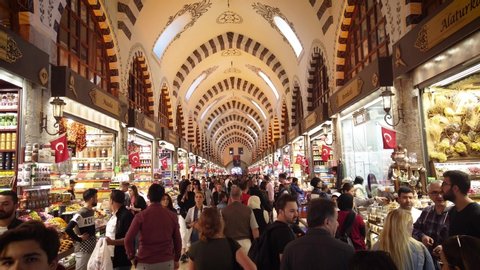 Istanbul, Turkey - October 2019: The shops and crowds of people inside the Egyptian Spice Bazaar of Eminonu district, the old city of istanbul