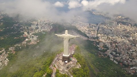 Rio De Janeiro / Brazil - 03 03 2019: Jesus Christ Statue Cinematic Aerial. Christ The Redeemer Landmark