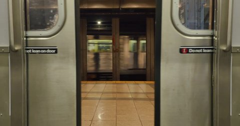 NEW YORK - CIRCA 2015 A low angle view of the doors of a New York subway car opening.