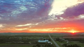 Amazing fiery Autumn sunrise over rural America, aerial drone view.
