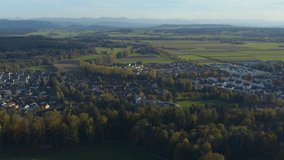 Aerial view of the city Leutkirch im Allgäu in Germany on a sunny afternoon in autumn. Pan to the right across thew whole city.