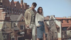 Focus pull of stylish man and woman