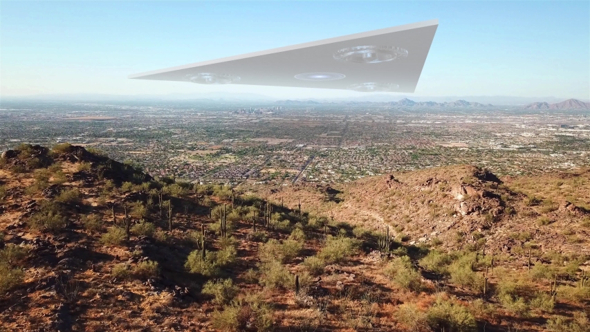 Triangle Alien Spaceship Hovering over Phoenix Arizona City Illustration
Powerful Video Illustration using real footage with visual effect elements of Large Triangle Alien Spaceship Hovers over Phoeni