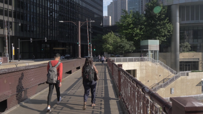 Shot through bridge railings on Chicago River and tall buildings, Chicago, Illinois, United States of America, North America