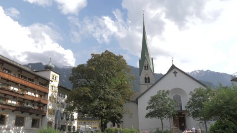 Gardens and church, Mayrhofen, Tyrol, Austrian Alps, Austria, Europe