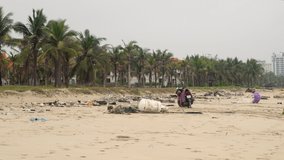 Global problem with tourism - trash on the beach, dirty plastic bottles, wasted nature. 