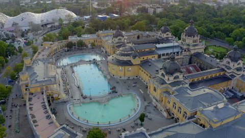 Europe, Hungary, Budapest. Aerial video about the Szechenyi thermal bath in the city park. Popular famous and historical medical bath in the city for citizens and tourist.