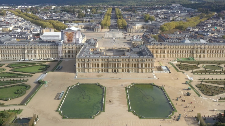 French castle, Palace of Versailles (Chateau de Versailles), drone aerial view with landscaped gardens & the surrounding area