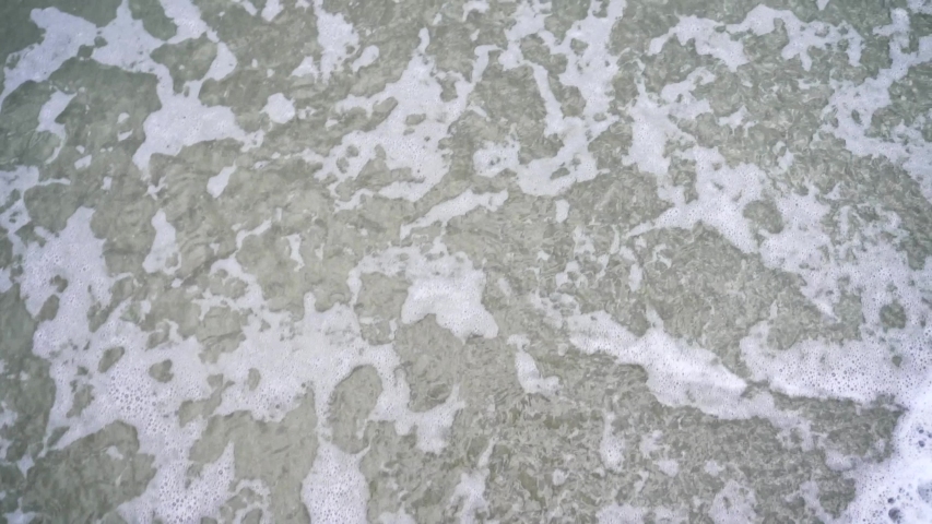 Waves washing up on beach in South Carolina.