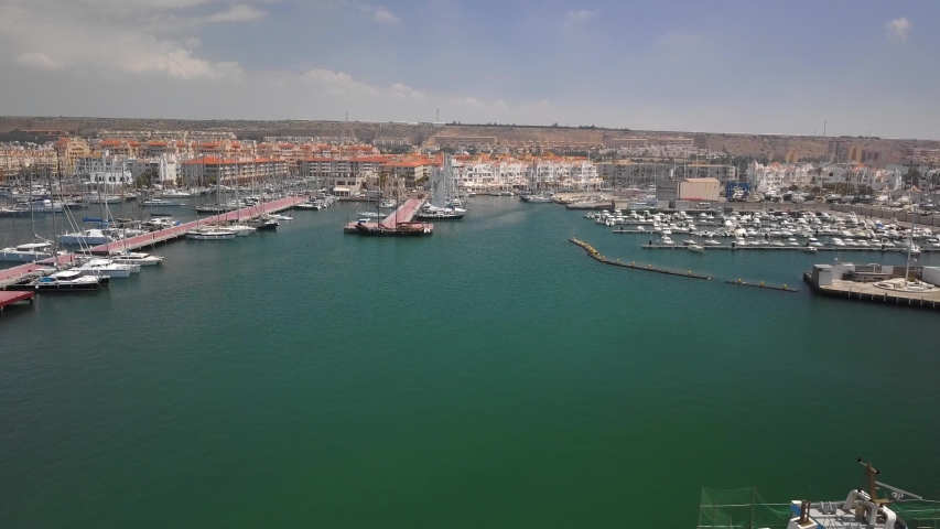 The harbour of Almerimar in Almeria during a sunny summer day. Aerial shot.