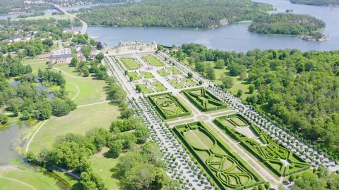 Stockholm, Sweden - June 23, 2019: Drottningholm. Drottningholms Slott. Well-preserved royal residence with a Chinese pavilion, theater and gardens, Aerial View, Departure of the camera