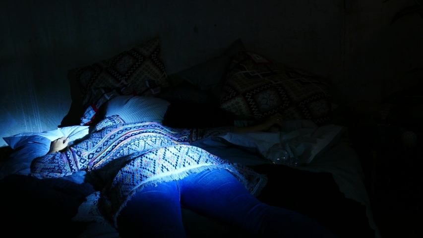 Bottle of alcohol in a woman