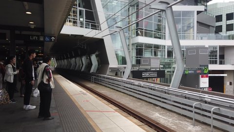 Chatswood Sydney, Australia - Sept 30 2019: passenger people commuter wait for heavy rail train T1 line to city on platform of Chatswood interchange station building. Transport for New South wales. 