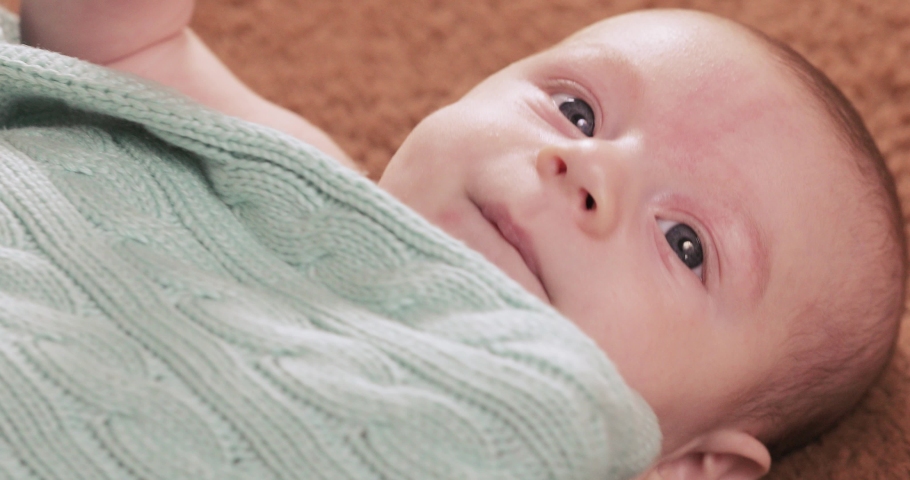 Under the knitted blanket baby boy